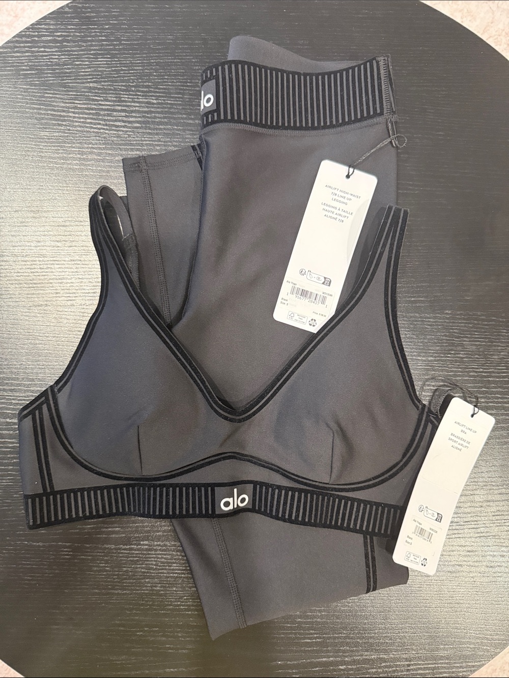 ALO Yoga Black AirLift Line Up Bra + AirLift High-Wsist 7/8 Line Up Leggings